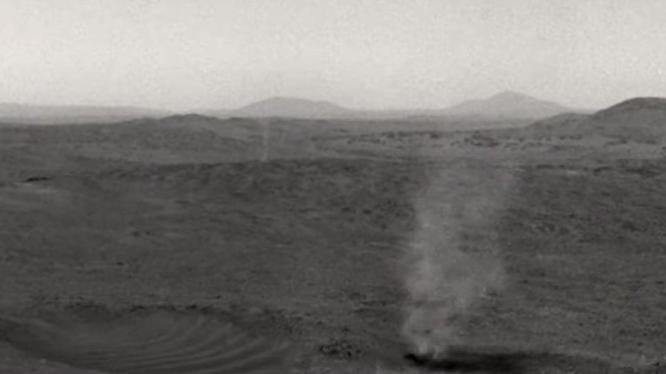 A great and powerful Martian dust devil swallows another in new video