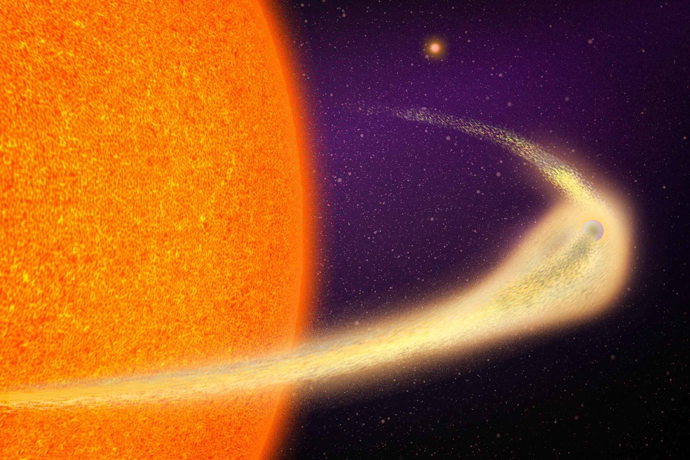 This weird planet sports a giant tail like a comet